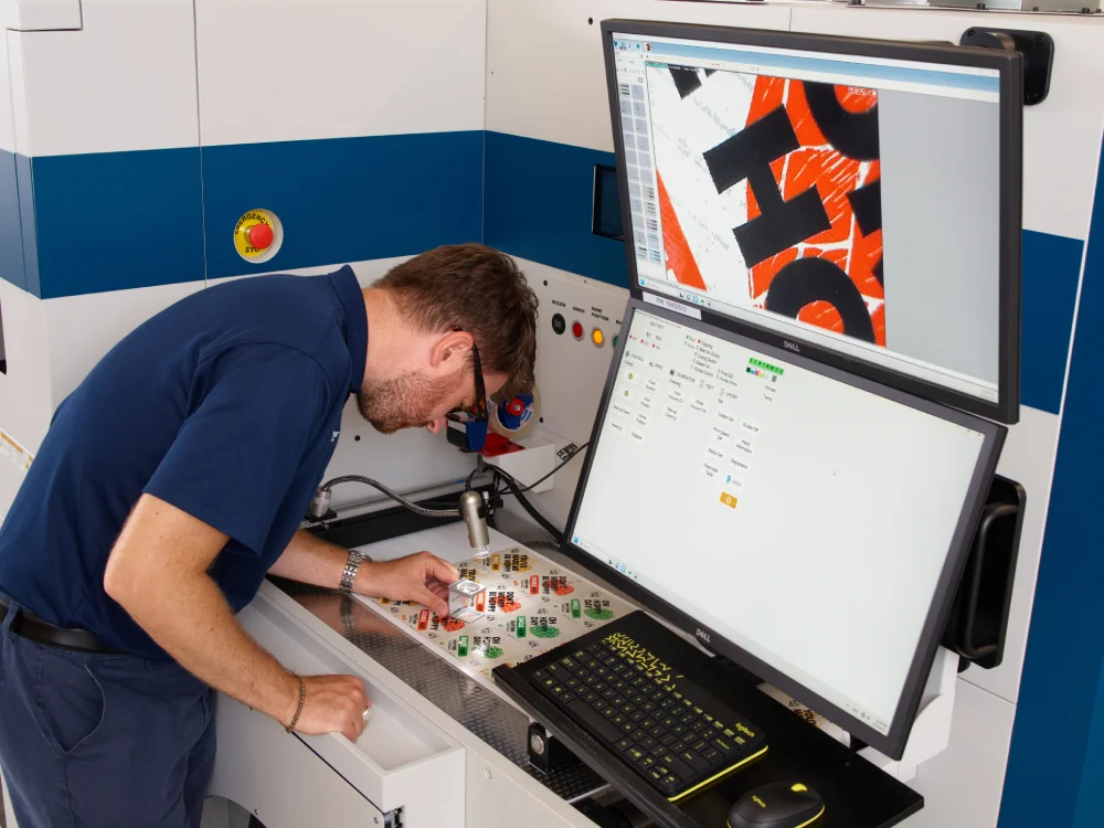 Domino N410 operator viewing excellent print quality